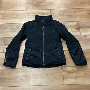Obermeyer Girls Black Ski Jacket with High Collar and Quilted Design